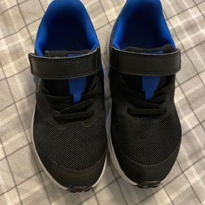 Toddler size 11c black blue Nike. Like new